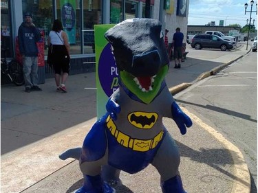 A dinosaur painted like Batman in Drumheller has been damaged. Photo courtesy Drumheller DinoArts Association.