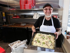 Angelo Contrada holds a pizza ready for the oven at POW Pizza in Renfrew on Thursday, January 17, 2019.  Gavin Young/Postmedia
