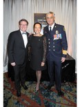 Looking fabulous at the Calgary Firefighters New Year's Eve Celebration at Hotel Arts in support of the Firefighters' CF2 SAFE program and the Calgary Herald  Christmas Fund are, from left: Calgary Herald editor Lorne Motley; event chair Ann McCaig; and Fire Chief Steve Dongworth.