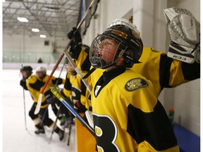 The Bow River Bruins PeeWee 4 Black Rylan Smith celebrates their win against the Crowfoot PeeWee 4 in Semi-Final Minor Hockey Action at the Shouldice arena in Calgary on Thursday January 17, 2019. Darren Makowichuk/Postmedia