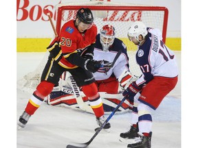 Calgary Flames Curtis Lazar attempts to redirect a puck past goalie Sergei Bobrovsky of the Columbus Blue Jackets during NHL hockey at the Scotiabank Saddledome in Calgary on Thursday, March 29, 2018. Al Charest/Postmedia