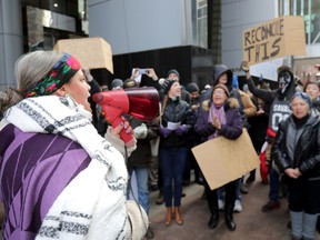 Police were in full force during a vocal counter protest in support of the TransCanada Coastal GasLink pipeline in downtown Calgary on Tuesday, Jan. 8, 2019.