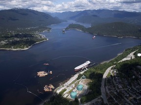 A aerial view of Kinder Morgan's Trans Mountain marine terminal, in Burnaby, B.C., is shown on Tuesday, May 29, 2018. Canada's Parliamentary budget watchdog says government paid "sticker price" for the Trans Mountain pipeline project when it purchased the pipeline from Kinder Morgan for $4.5 billion.