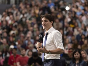 The NDP government could learn from Prime Minister Justin Trudeau, who speaks during a town hall last week in Regina despite various threats, says columnist.