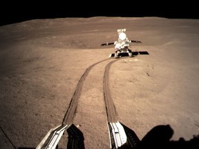 In this photo provided on Jan. 4, 2019, by China National Space Administration via Xinhua News Agency, Yutu-2, China's lunar rover, leaves wheel marks after leaving the lander that touched down on the surface of the far side of the moon. China's space agency says that all systems are go for its spacecraft and rover that have made a pioneering landing on the far side of the moon. (China National Space Administration/Xinhua News Agency via AP)