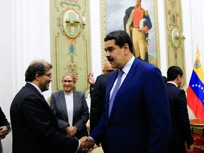 This handout picture released by the Venezuelan presidency shows President Nicolas Maduro meeting with business attaches from European Union embassies in Caracas on January 18, 2019.