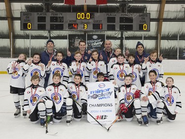 The Northwest Warriors 4 White took the Esso Minor Hockey Week title in the Atom 4 North division. Cory Harding Photography