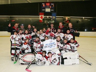 Trails West Wolves 4 White captured the crown in the Atom 4 South division during Esso Minor Hockey Week. Cory Harding Photography