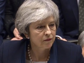 In this grab taken from video, Britain's Prime Minister Theresa May speaks after losing a vote on her Brexit deal, in the House of Commons, London, Tuesday Jan. 15, 2019.