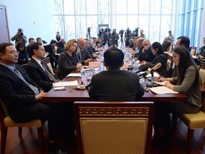 Chinese ambassador to Canada Lu Shaye, centre, meets with media at the Embassy of the People's Republic of China in Ottawa on Thursday, Jan. 17, 2019.