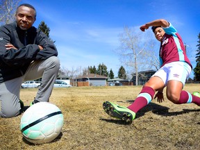 Left, Jean-Claude Munyezamu from Soccer Without Boundaries and Moneer Mahalhel at the Glenbrook Community Association field in Calgary on April 17, 2017.