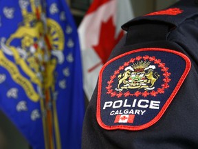 A Calgary Police officer displays the new shoulder badge in Calgary on Thursday, January 10, 2019. Jim Wells/Postmedia