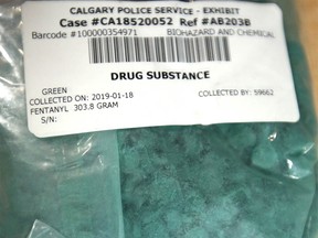 A quantity of fentanyl pills seized by Calgary Police and ALERT is displayed at a press conference in Calgary on Wednesday, January 30, 2019. The suspected lab was operating inside a detached garage at a home in the Calgary neighbourhood of Forest Lawn.Jim Wells/Postmedia