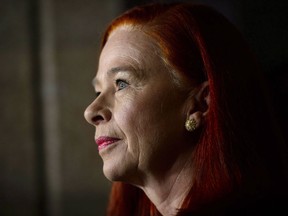 President and CEO of CBC/Radio-Canada Catherine Tait looks on during a press conference in the foyer of the House of Commons on Parliament Hill in Ottawa on April 3, 2018.