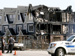 Fire extensively damaged townhomes being built in the Fireside neighbourhood of Cochrane in the early morning of June 6, 2018.