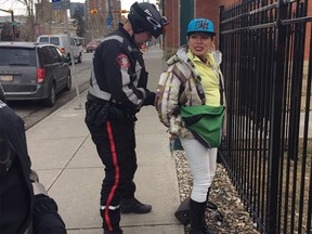 A police officer handcuffs Lucky and seizes her drugs. She is released with a warning.