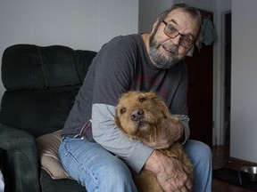 Stan Parsons, 84, and his dog Jellybean, pictured at their home on Friday, Jan. 18, 2019. Stan and his pet have found a new place to live in Calgary.