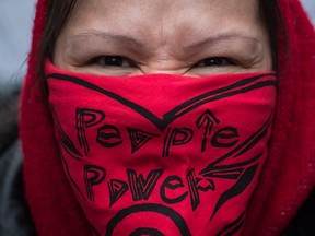 A protester shouts during a march in support of pipeline protesters in northwestern British Columbia, in Vancouver, on Tuesday.