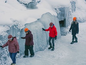 An image of a group of hikers on a Malign Canyon Icewalk - Jasper in winter