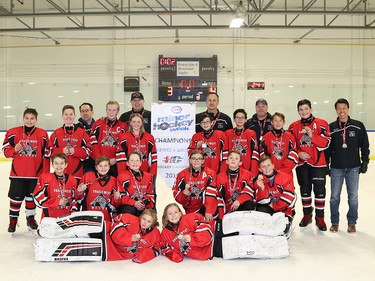 The Pee Wee 4 South division champions in Esso Minor Hockey Week were Trails West 4 White. Cory Harding Photography