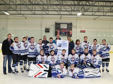 Capturing the Pee Wee 5 South division during Esso Minor Hockey Week were the Glenlake Hawks 5 Blue. Cory Harding Photography