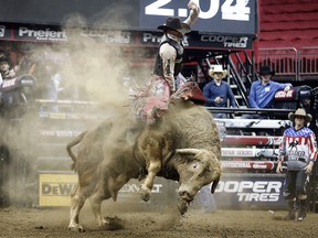 In this Feb. 11, 2017 file photo, Mason Lowe rides Cochise during a Professional Bull Riders event at the Sprint Center in Kansas City, Mo. Lowe died on Jan. 15, 2019, after a bull stomped on his chest during a PBR chute-out competition at the National Western Stock Show in Denver.