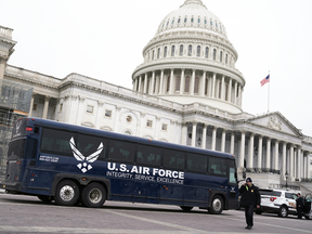 An empty U.S. Air Force bus waits outside the U.S. Capitol for a Congressional delegation, including House Speaker Nancy Pelosi, that was scheduled for an overseas trip Jan. 17, 2019 in Washington.