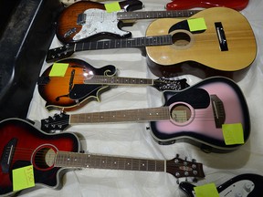 RCMP released this photo of guitars recovered during an investigation into a break and enter near Innisfail.