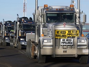 A convoy of trucks rumbles through Nisku on Dec. 19, 2018, in support of Alberta's oil and gas industry.