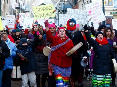 The women's march started outside Bankers Hall and went to the steps of city hall in Calgary.