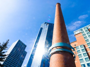 Eau Claire's 27-metre red brick smokestack built in 1947 in Calgary on Friday, March 31, 2017. The brick smokestack was de-designated as a heritage site so it could be moved about 10 metres to the southwest at a to-be-determined future date, and re-designated in its new location. Pier Moreno Silvestri/Postmedia Network