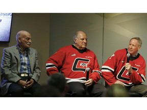 Bearcat Murray, equipment manager for the Calgary Centennials, Cowboys, Wranglers and Flames and early 70's Centennials players Jerry Holland, middle and Mike Rogers at the Scotiabank Saddledome in Calgary, on Thursday January 31, 2019 during the The Corral Series Luncheon. Leah Hennel/Postmedia