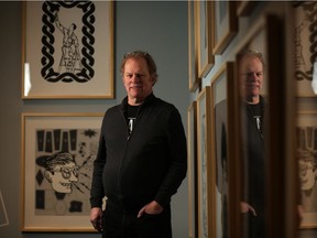 Chris Cran with some of his artwork at the Glenbow Museum in Calgary, on Thursday February 14, 2019. Leah Hennel/Postmedia