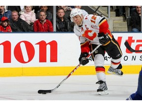 TORONTO - MARCH 14:  Jarome Iginla #12 of the Calgary Flames takes a shot against the Toronto Maple Leafs during their NHL game at the Air Canada Centre March 14, 2009 in Toronto, Ontario.