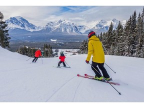 Skiers enjoy superb conditions at Lake Louise in Banff National Park.