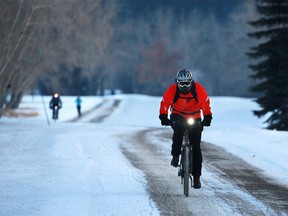 Winter cyclists commute home along the bike path near Edworthy Park on a -20 C afternoon,  Wednesday February 6, 2019. Gavin Young/Postmedia