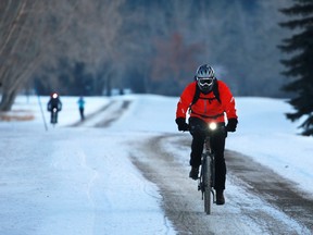 Winter cyclists commute home along the bike path near Edworthy Park on a -20 C afternoon,  Wednesday February 6, 2019. Gavin Young/Postmedia