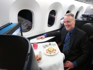 Westjet's President and CEO Ed Sims sits in one of the business class pods on the company's first Boeing 787 Dreamliner on Thursday February 14, 2019. Westjet let media tour the interior of the new aircraft in Calgary.