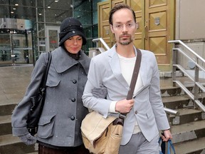 Jennifer and Jeromie Clark leave Calgary Courts on Monday, Oct. 1, 2018.