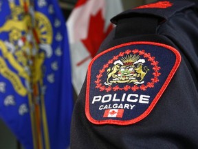 A Calgary Police officer displays the new shoulder badge in Calgary on Thursday, January 10, 2019. The service will start distributing the badges this month this month. A two-year rollout will see all officers wearing the new design by December 2020. Jim Wells/Postmedia