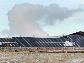 Solar panels are shown near the Shepard Landfill site in southeast Calgary on Thursday, February 7, 2019. DP Energy is proposing a 156-acre solar energy production facility within Calgary city limits. If approved, it would be the largest in Western Canada. The company is eyeing a property in the Shepard industrial site off Barlow Trail S.E. which is currently owned by Viterra, which would lease the land to DP Energy. Jim Wells/Postmedia