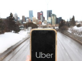 Rideshare trips for companies such as Uber are up sharply compared to taxi rides in Cagary. Jim Wells Photo illustration/Postmedia