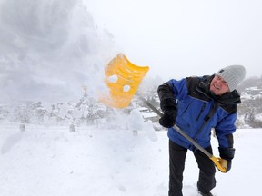 Darryl Sankey like most Calgarians was busy clearing snow as the city recieved another dump of the white stuff with cold temperatures on Saturday February 16, 2019.