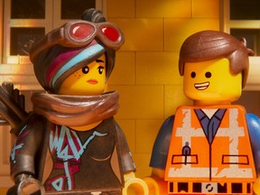 Lucy/Wyldstyle, voiced by Elizabeth Banks, left, and Emmet, voiced by Chris Pratt.