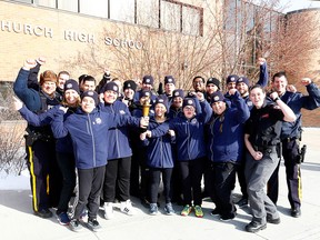 Members from the Alberta Law Enforcement Torch Run team and athletes bring the Special Olympics torch to Burt Church High School in Airdrie, one of several local schools they visited to create excitement and awareness for the Special Olympics Alberta Winter Games.