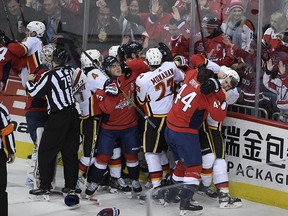 The Washington Capitals and the Calgary Flames scuffle at the end of the game on Friday, Feb. 1, 2019, in Washington.