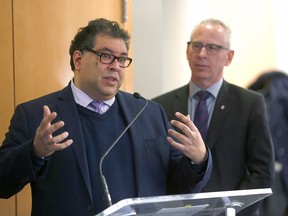 Mayor Naheed Nenshi and Dr. Ed McCauley, president and vice-chancellor of the University of Calgary, at a news conference announcing an $8.5-million grant to the Life Sciences Innovation Hub in Calgary on Wednesday, Feb. 6, 2019.