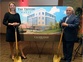 Bev Higham-Linehan, president and CEO of Calbridge Homes, and Joe Ferraro, chairman and founder of Calbridge Homes, with an artist's rendering of the new affordable, permanent supportive housing building in Forest Lawn, named the Triveri.