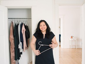 Helen Youn organizing her clothes.
