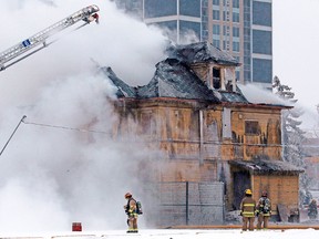 Calgary firefighters fight a two alarm blaze in the Enoch Sales historic home in Victoria Park  on Saturday February 2, 2019.